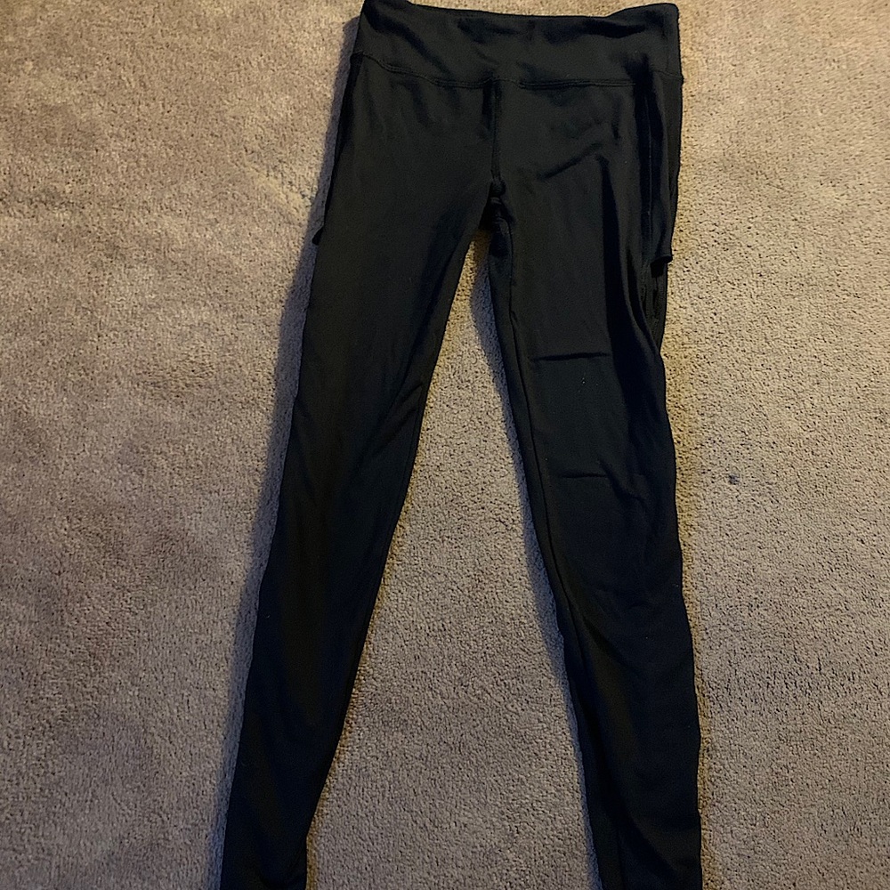 These are a black leggings with see through sides.